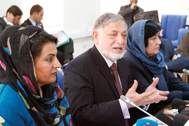At a news conference in the Afghan capital, Kabul, on 2 April 2014, the head of the Independent Election Commission (IEC), Dr. Ahmad Yusuf Nuristani (centre), said “Although there are security threats, but Afghans have to show to the world that these threats cannot weaken their determination to participate in the elections and shape the future of their country.” Photo: Sayed Muhammad Shah / UNAMA