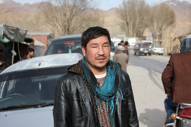 A driver in Foladi Valley (Bamyan province), Hussain Ali, 30, says, “Since the road is asphalted our lives are made easier. Before, I had to travel for 40 minutes to reach to my house, but now it takes only 15 minutes. Before, I had to take my car for repairing every week, but this time, for last one month I have not seen a mechanic.” Photo: Jaffar Rahim / UNAMA