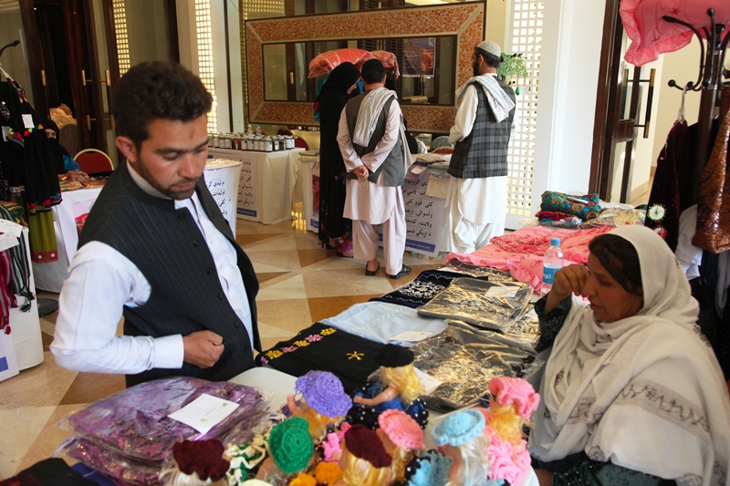 One of the stalls set up by Afghan women entrepreneurs displaying their products, hoping to explore potential buyers from abroad. Photo: Fardin Waezi / UNAMA
