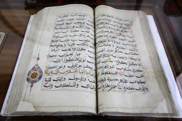 A copy of the Koran is on display at a week-long exhibition of ornamental manuscripts of Islamic culture that opened in Kabul on 13 April 2013. The exhibition is a part a series of events marking the declaration of the south-eastern city of Ghazni as the Asian Capital of Islamic Culture for this year. Photo: Fardin Waezi / UNAMA