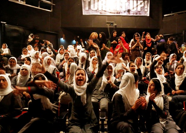 Afghan girls enjoying the all-women concert on the opening day of the Sound Central Music Festival in Kabul on 30 April 2013. Photo: Ellie Kealey