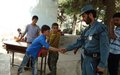 UN-backed Afghan community police teach schoolchildren about safety measures
