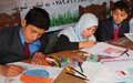 On international day, Afghan children paint and athletes run with message to protect Earth