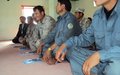 Afghan police patrolling drug route undergo passport, visa and human rights training with UN support